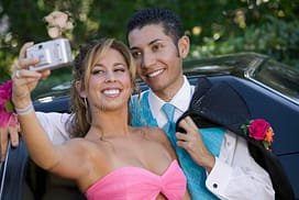 Young Girl and Boy Pose For The Prom Day